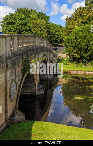 Ornate river cam bridge leads to Audley End House and gardens near Saffron Walden, Essex, England, UK, GB Stock Photo