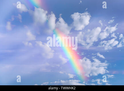 Real Rainbow and Sky with Clouds as Background or Texture Stock Photo