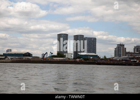Skyline as seen from the back of a Thames Clipper boat on the River Thames, London Stock Photo