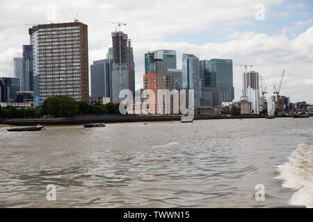 Skyline as seen from the back of a Thames Clipper boat on the River Thames, London Stock Photo