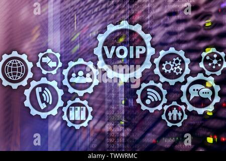 VoIP Voice over IP on the screen with a blur background of the server room. The concept of Voice over Internet Protocol. Stock Photo