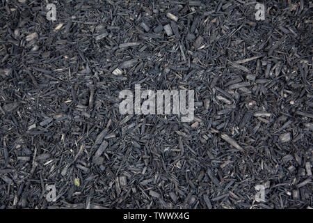grey coloured chips or dirt make a natural background Stock Photo