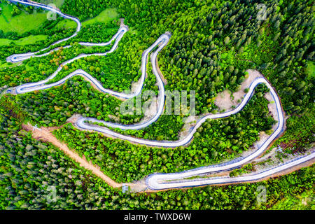 Winding road to the Ughviri Pass in Georgia Stock Photo