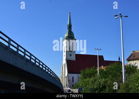 Panoramic view of St. Martins Cathedral in Bratislava with Most SNP bridge aside Stock Photo
