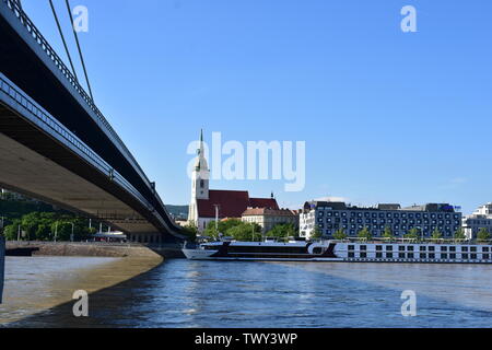 Perspective view of bridge Most SNP focusing far at St. Martin Cathedral in Bratislava Stock Photo