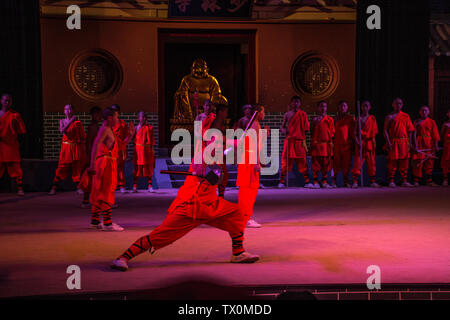 The martial monks are performing Shaolin Kung Fu at the Songshan Shaolin Temple in Dengfeng City, Zhengzhou, Henan Province, on March 17, 2019. Stock Photo