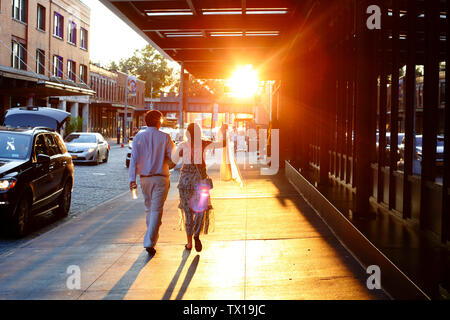 People walking in the Meatpacking District of Manhattan, New York, NY on a warm summer afternoon on the summer solstice (June 21, 2019) Stock Photo