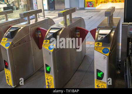 The fare pay zone exit gate of the Taipei metro station in Taipei, Taiwan Stock Photo