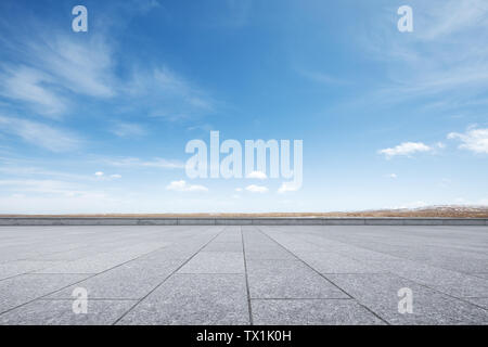 Empty marble floor with snow mountains Stock Photo