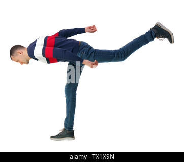 Back view man Balances waving his arms. Rear view people collection. backside view of person.  Isolated over white background. Stock Photo