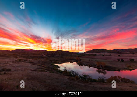 Landscape with mountains, dawn and sky. No one touches nature. Nature. Dusk at night. Outdoor fog. Hills in the autumn. The sun is beautiful, scenic light, valleys, rocks and comfortable weather. Sunrise on the dam. Prairie photography photography color Stock Photo