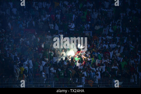 Cairo. 23rd June, 2019. Fans of Algeria celebrate during the 2019 African Cup of Nations Group C match between Algeria and Kenya in Cario, Egypt on June 23, 2019. Algeria won 2-0. Credit: Wu Huiwo/Xinhua/Alamy Live News Stock Photo