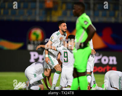 Cairo. 23rd June, 2019. Players of Algeria celebrate during the 2019 African Cup of Nations Group C match between Algeria and Kenya in Cario, Egypt on June 23, 2019. Algeria won 2-0. Credit: Wu Huiwo/Xinhua/Alamy Live News Stock Photo