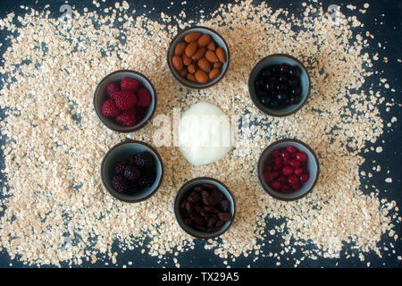 Bowls with ingredients for cereals Stock Photo