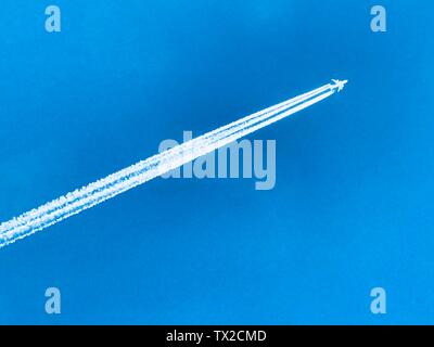 A flying plane, close-up. Stock Photo