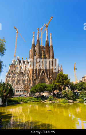 BARCELONA, SPAIN - JUNE 12, 2014: The famous Catholic basilica of the Sagrada Familia in Barcelona, Catalonia, Spain. Designed by Antoni Gaudi. Stock Photo