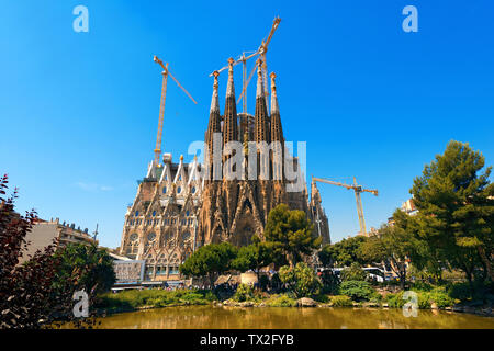 BARCELONA, SPAIN - JUNE 12, 2014: The famous Catholic basilica of the Sagrada Familia in Barcelona, Catalonia, Spain. Designed by Antoni Gaudi. Stock Photo