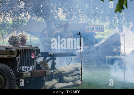 Re-enactors Firing A Machine Gun During a Arnhem Battle Re-enactment at Barnard Castle, 1940's Weekend 2019, Teesdale, County Durham, UK. Stock Photo