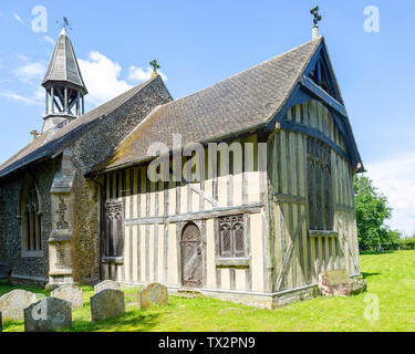 Village parish church of All Saints, Crowfield, Suffolk, England, UK with wooden timber framed chancel Stock Photo