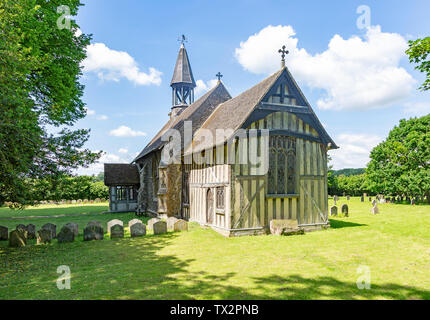 Village parish church of All Saints, Crowfield, Suffolk, England, UK with wooden timber framed chancel Stock Photo