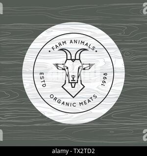 A goat is drawn in a linear style for a farm logo on a background of vector wood texture. Stock Vector