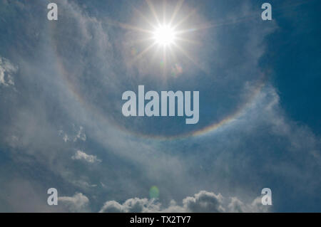 In the middle of summer, there's a halo around the sun. Stock Photo