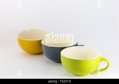 Three cups color of coffee  on white background. Stock Photo