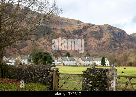 Coniston village in the lake District with farmland and dry stone walling,Lake District,Cumbria,England Stock Photo