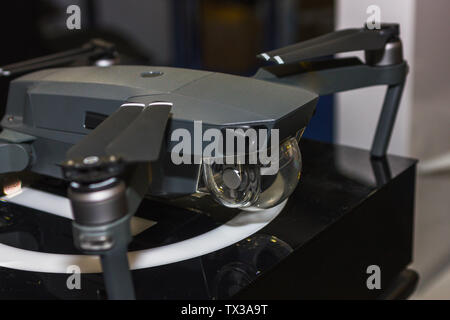 Quadcopter for flying on the radio. Drone for shooting photos and video from a height of flight. Stock Photo