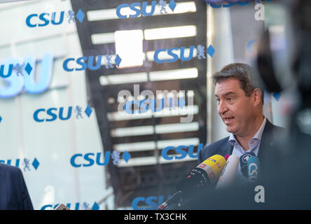 Munich, Germany. 24th June, 2019. Markus Söder, CSU Party Chairman and Prime Minister of Bavaria, talks to the waiting journalists before the CSU executive board meeting. Credit: Peter Kneffel/dpa/Alamy Live News Stock Photo