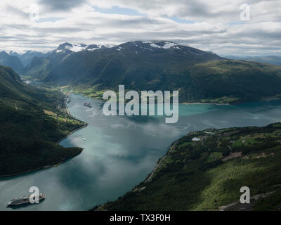 Scenic view idyllic green cliffs and fjord, Olden, Norway Stock Photo