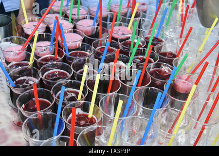 Multi colored straws in cocktails Stock Photo