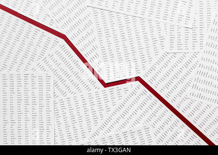 View from above red descending line through paperwork Stock Photo