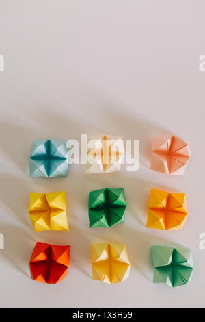 Multicolored origami fortune tellers on white background Stock Photo