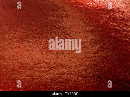 Red shiny foil texture as an abstract background Stock Photo