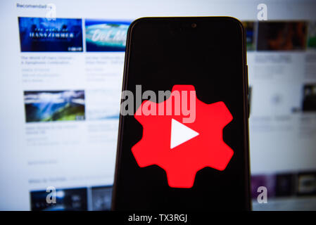 In this photo illustration a Youtube Music logo seen displayed on a smartphone. Stock Photo