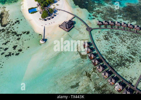 Maldives, South Male Atoll, aerial view of resort with bungalows on island Olhuveli