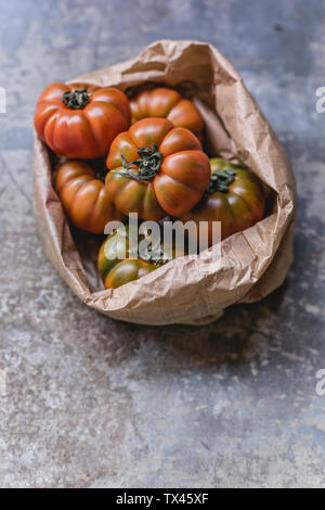 Sardinian beef tomatoes in paper bag Stock Photo