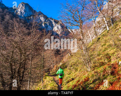 Spain, Asturia, Cantabrian Mountains, senior man on a hiking trip