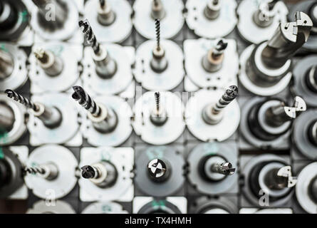 CNC Machine, row of boring bits Stock Photo
