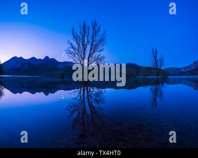 Spain, Asturias, Camposolillo, view over Porma reservoir and Cantabrian Mountains at dusk Stock Photo