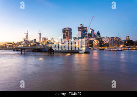 UK, London, Skyline at sunset with Hms Belfast in the foreground