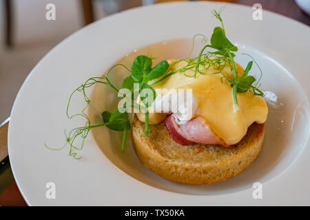 Close up shot of a dish of egg benedict, ate at Budapest, Hungary Stock Photo