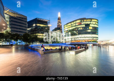UK, London, modern office buildings at dusk Stock Photo
