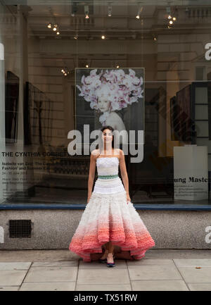 Royal Opera Arcade Gallery, London, UK. 24th June 2019. ‘The Camouflaged Beauty of Fashion’, exhibition by Dutch artist, Isabelle van Zeijl runs from 24–30 June 2019, as part of Mayfair Art Weekend. Isabelle van Zeijl’s striking photographic self-portraits merge references from the Old Masters, with modern-day consumer imagery. Credit: Malcolm Park/Alamy Live News. Stock Photo