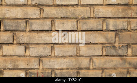 Nostalgic brick walls, mottled tree shadows Stock Photo