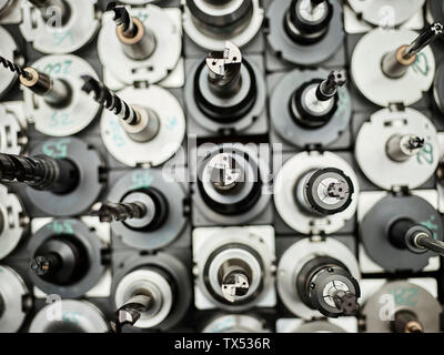 CNC Machine, row of boring bits Stock Photo