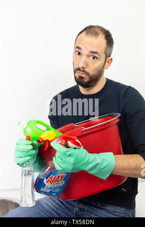 A man with cleaning products. Stock Photo