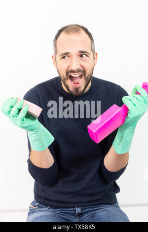 A man with cleaning products. Stock Photo