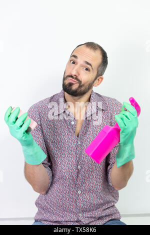 A man with cleaning products. Stock Photo